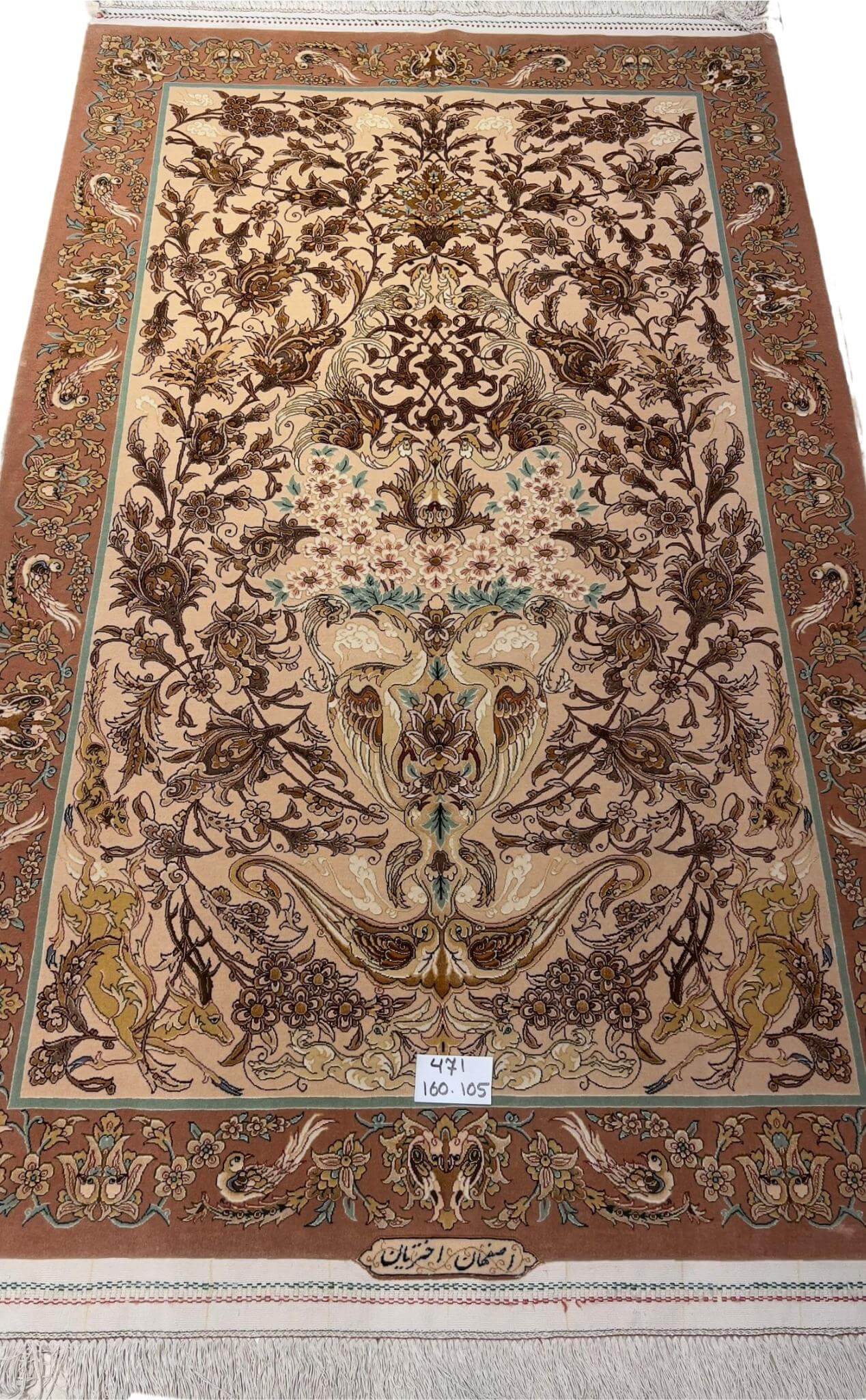 Persian Isfahan rug by Akhtarian with floral motifs.